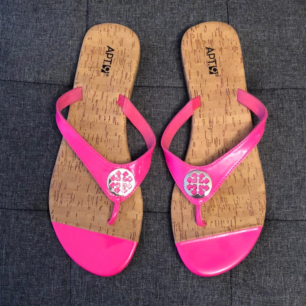 Bright pink Apt 9 flip flops.